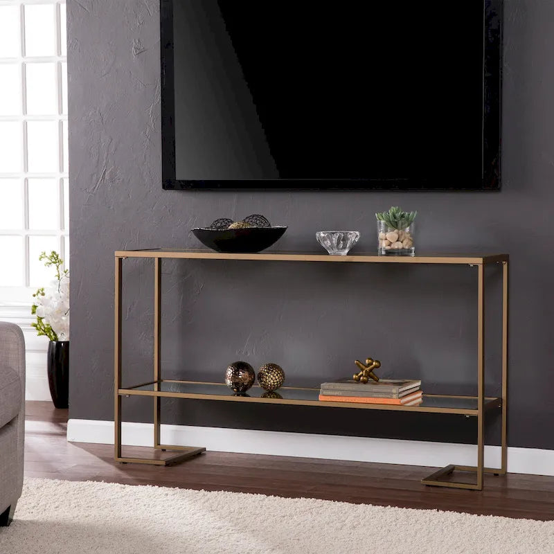 Consolle con finitura oro, piano in vetro e ripiano a specchio