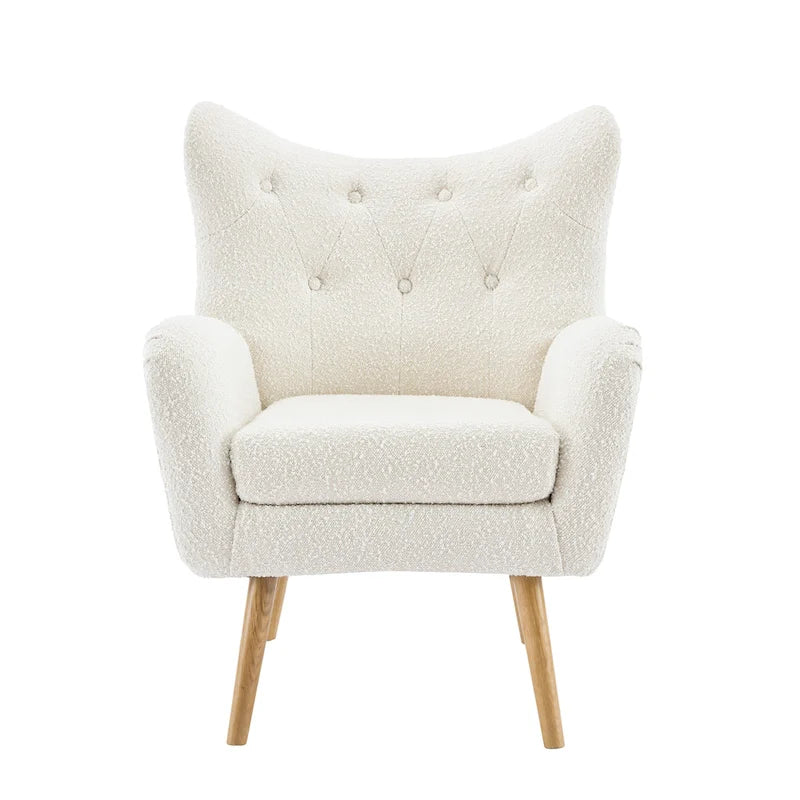 Poltrona club tufted con schienale ad alette Bouclé mandorla