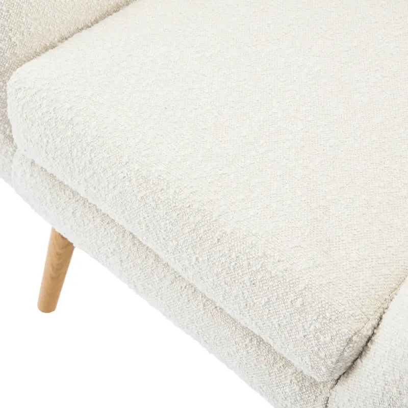 Poltrona club tufted con schienale ad alette Bouclé mandorla